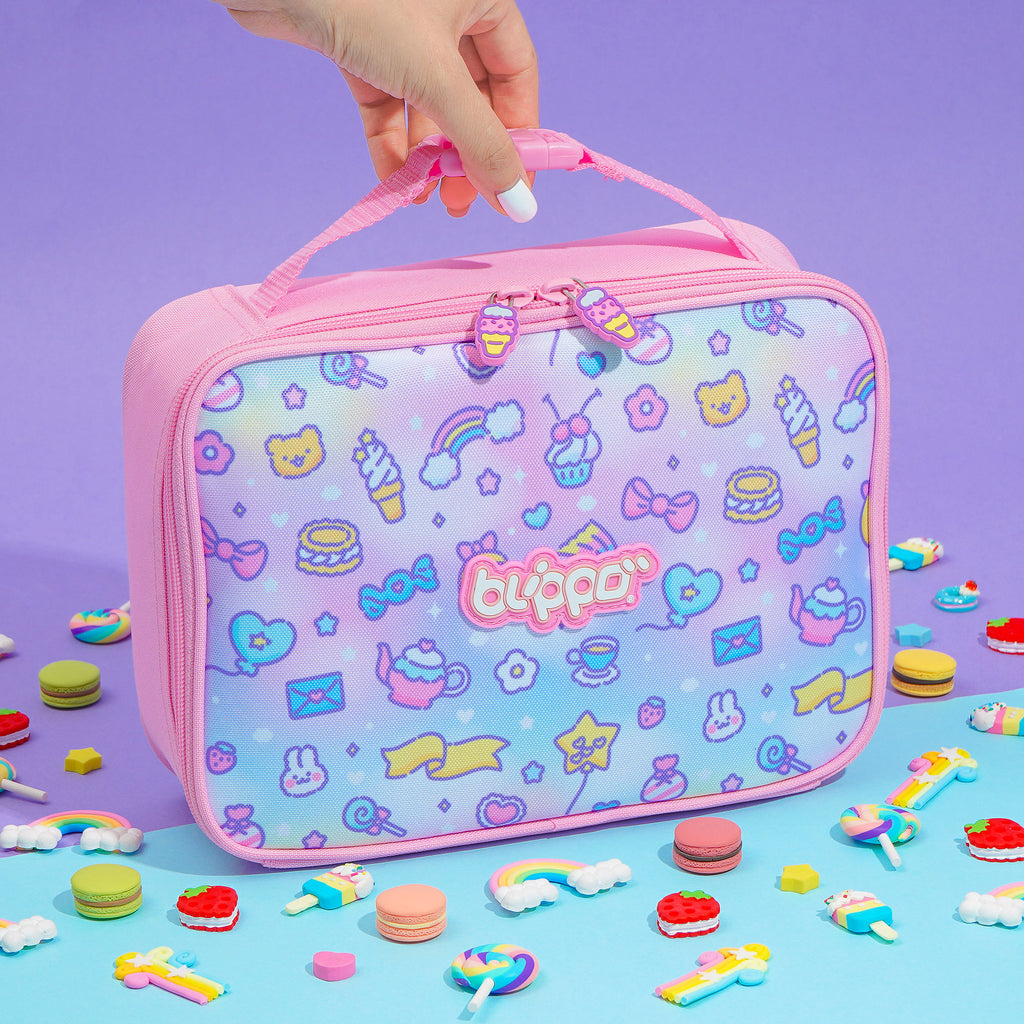 Holding a cute pink insulated lunch box designed for girls and featuring kawaii designs for school.