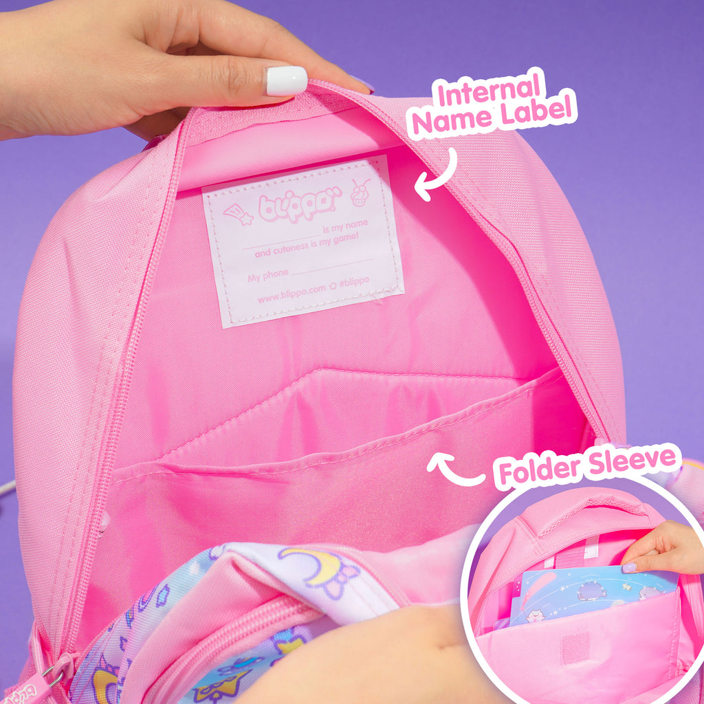 Opening a cute girls’ backpack for school. Featuring pink kawaii designs.