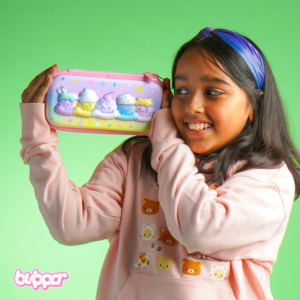 Girl holding a pink kawaii pencil case for girls