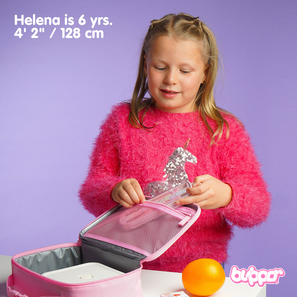 Girl opening a cute pink insulated lunch box designed for kids.