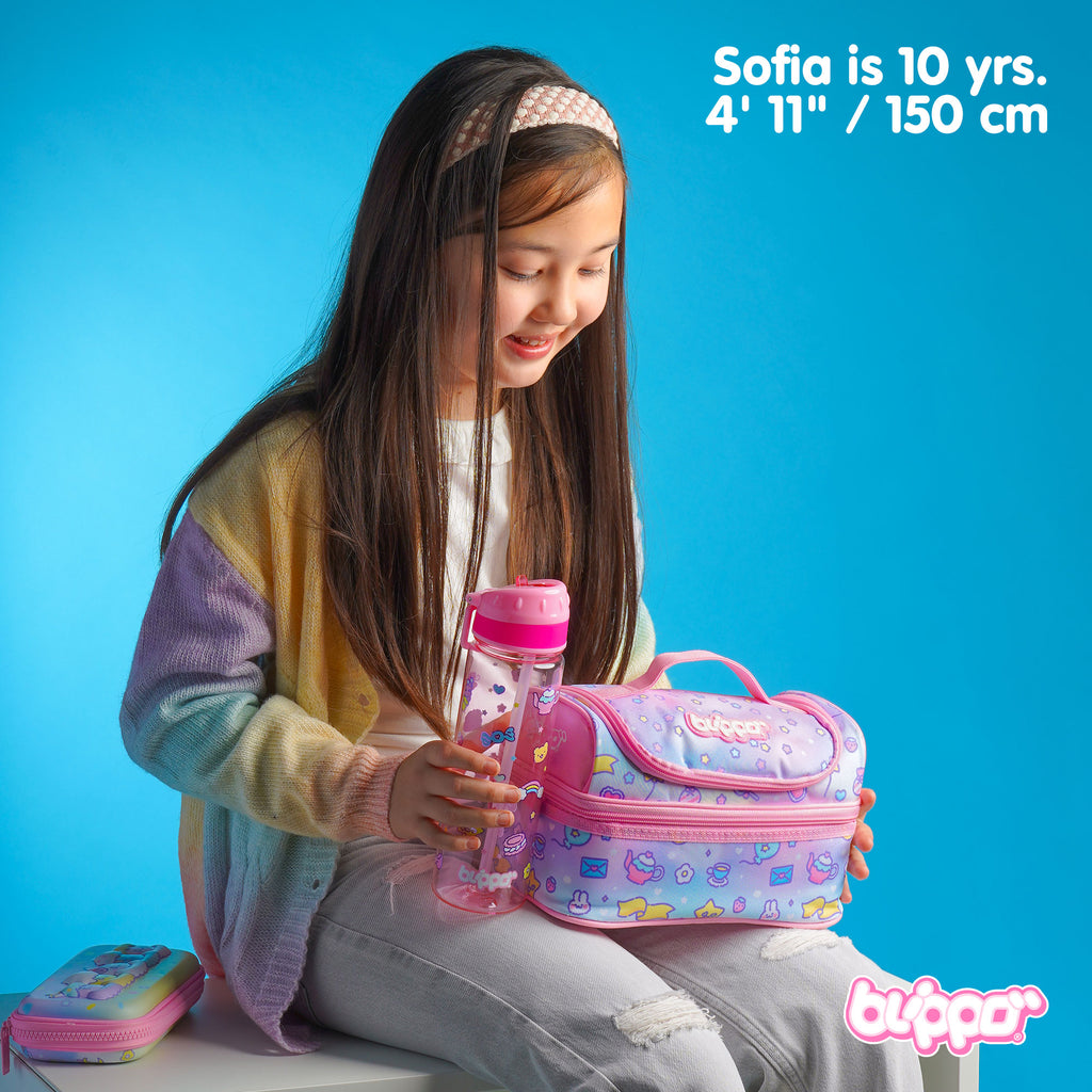 Girl holding a cute pink insulated lunch box designed for kids.